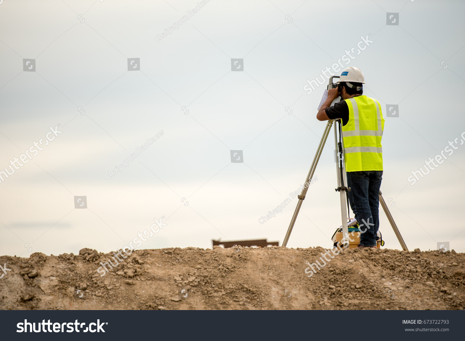 Stock Photo Survey Engineer In Construction Site Use Theodolite Mark A Concrete Pile Co Ordinate 673722793